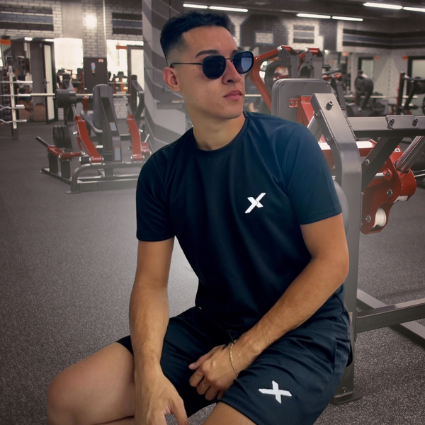 Conjunto Camiseta NEXT + Shorts NEXT de Compressão